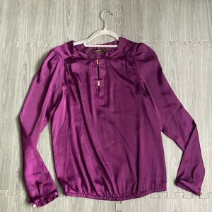 Silky purple blouse with gold accents